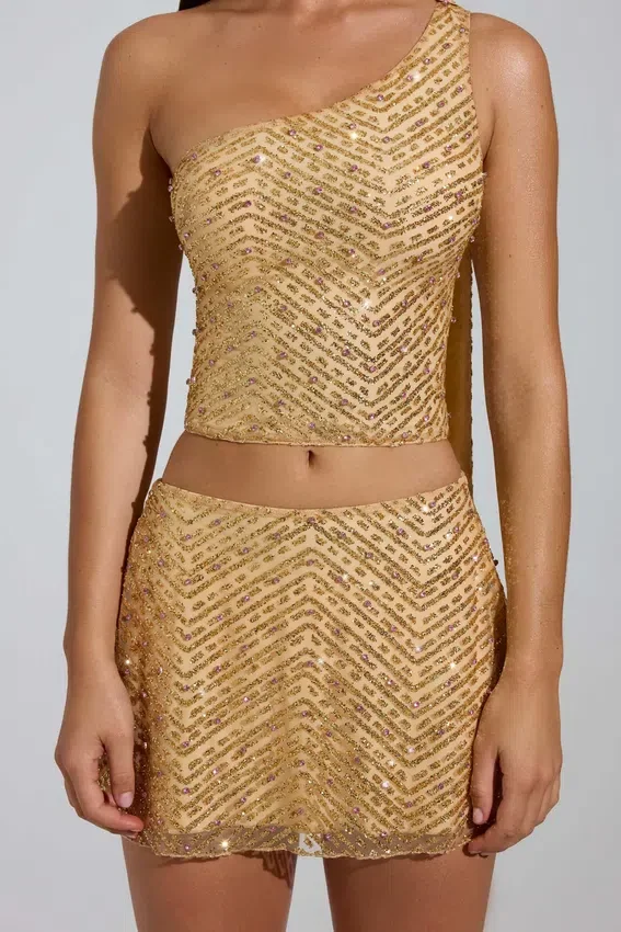 Adhara Embellished Low-Rise A-Line Micro Mini Kjolar i guld Adhara Embellished Low-Rise A-Line Micro Mini Kjolar i guld