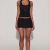 Aine Embellished Jersey Scoop-Neck Racerback Top i svart Aine Embellished Jersey Scoop-Neck Racerback Top i svart