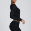 Alia Modal Ruched Long-Sleeve Top i svart Alia Modal Ruched Long-Sleeve Top i svart