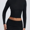 Alia Modal Ruched Long-Sleeve Top i svart Alia Modal Ruched Long-Sleeve Top i svart