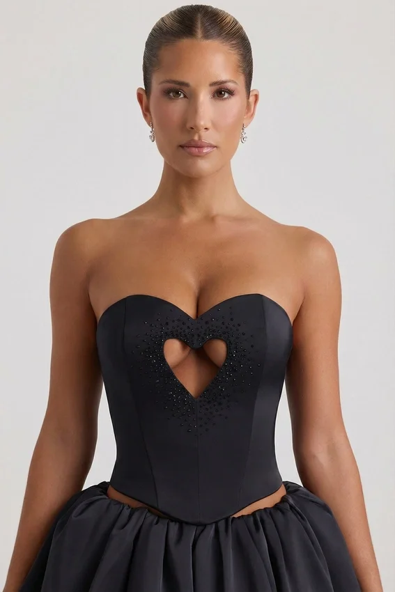 Amora Embellished Heart Cut-Out Strapless Corset Top i svart Amora Embellished Heart Cut-Out Strapless Corset Top i svart