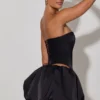 Amora Embellished Heart Cut-Out Strapless Corset Top i svart Amora Embellished Heart Cut-Out Strapless Corset Top i svart