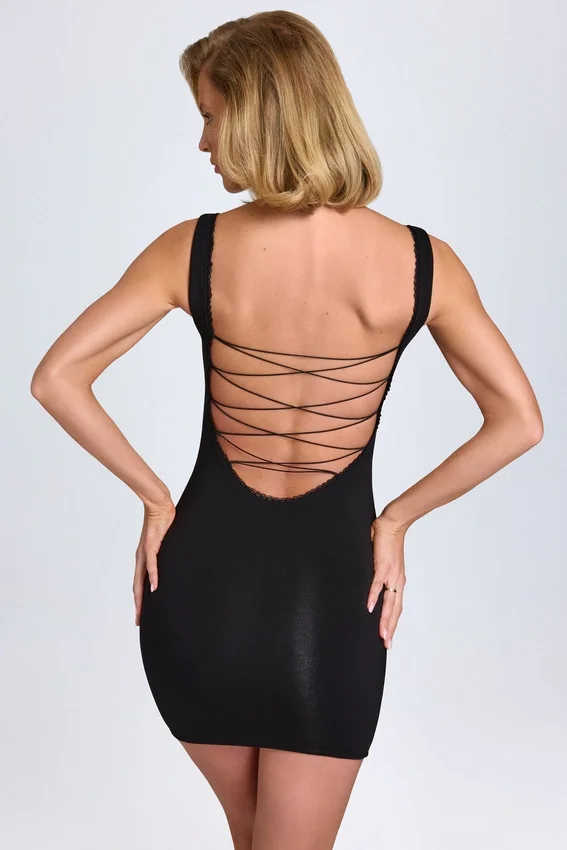 Aoife Modal Lace-Trim Bodycon Miniklänning i svart Aoife Modal Lace-Trim Bodycon Miniklänning i svart