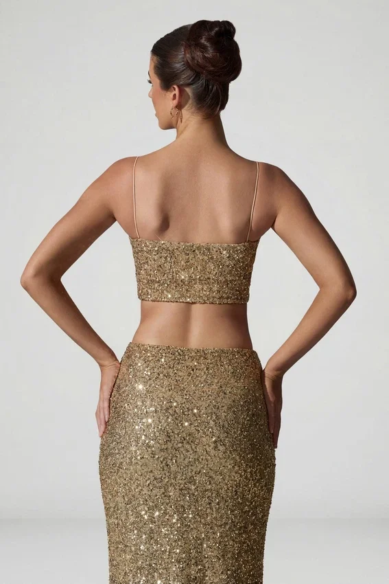 Ariana Embellished Cut-Out Crop Top i guld Ariana Embellished Cut-Out Crop Top i guld