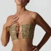 Ariana Embellished Cut-Out Crop Top i guld Ariana Embellished Cut-Out Crop Top i guld