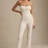 Arlena Jumpsuit med spets och rosettdetaljer i färg Ivory Arlena Jumpsuit med spets och rosettdetaljer i färg Ivory