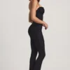Arlena Jumpsuit med spets och rosettdetaljer i svart Arlena Jumpsuit med spets och rosettdetaljer i svart