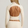 Auri Modal Ruched Backless Turtleneck Top i Ivory Auri Modal Ruched Backless Turtleneck Top i Ivory