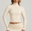 Auri Modal Ruched Backless Turtleneck Top i Ivory Auri Modal Ruched Backless Turtleneck Top i Ivory