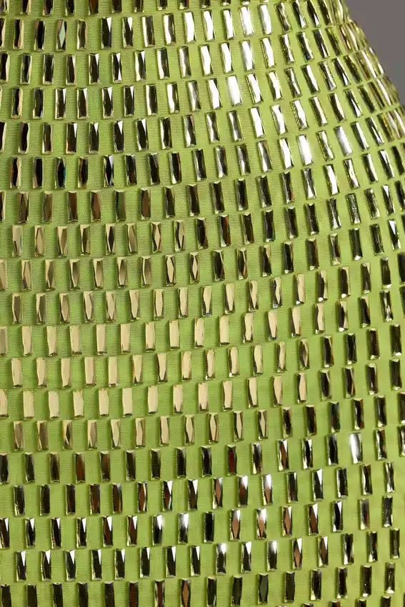 Aurora miniklänning med bandeau och dekorationer i pärongrönt Aurora miniklänning med bandeau och dekorationer i pärongrönt