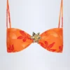 Baracoa bikinitopp med halterneck och metallbeslag i orange orkidé-mönster Baracoa bikinitopp med halterneck och metallbeslag i orange orkidé-mönster