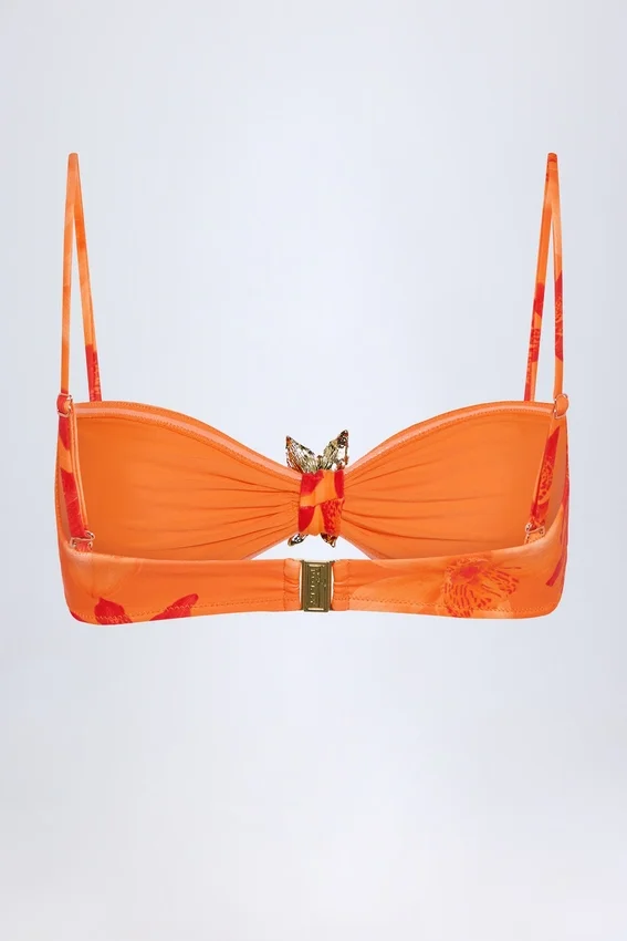 Baracoa bikinitopp med halterneck och metallbeslag i orange orkidé-mönster Baracoa bikinitopp med halterneck och metallbeslag i orange orkidé-mönster