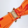 Baracoa bikinitopp med halterneck och metallbeslag i orange orkidé-mönster Baracoa bikinitopp med halterneck och metallbeslag i orange orkidé-mönster