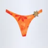 Beqa Bikinibyxor med metalldetaljer i orange orkidé-mönster Beqa Bikinibyxor med metalldetaljer i orange orkidé-mönster