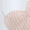 Biarritz baddräkt med utskärningar och halterneck i mauve Biarritz baddräkt med utskärningar och halterneck i mauve