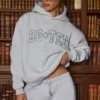 Broderad oversized-hoodie i gråmelerad Broderad oversized-hoodie i gråmelerad