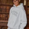 Broderad oversized-hoodie i gråmelerad Broderad oversized-hoodie i gråmelerad