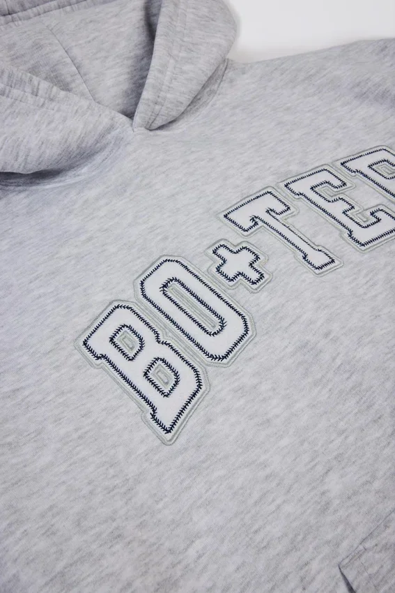 Broderad oversized-hoodie i gråmelerad Broderad oversized-hoodie i gråmelerad
