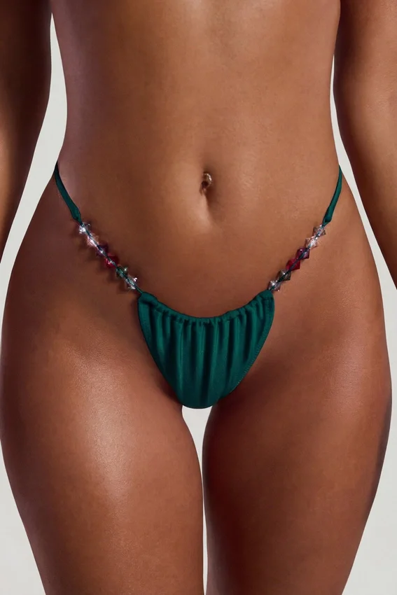 Cabo triangel-bikinitopp med pärldekor i jadegrönt Cabo triangel-bikinitopp med pärldekor i jadegrönt