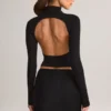 Cali Modal Ruched Mid-Rise Mini Kjol i svart Cali Modal Ruched Mid-Rise Mini Kjol i svart