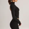 Cali Modal Ruched Mid-Rise Mini Kjol i svart Cali Modal Ruched Mid-Rise Mini Kjol i svart