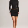 Cali Modal Ruched Mid-Rise Mini Kjol i svart Cali Modal Ruched Mid-Rise Mini Kjol i svart