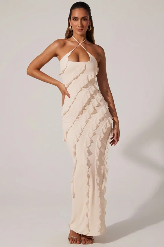 Calico Cross Strap Ruffle Floor Length Klänning i ivory Calico Cross Strap Ruffle Floor Length Klänning i ivory