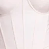 Cassandra vinylkorsett-crop-top med bygel i vitt Cassandra vinylkorsett-crop-top med bygel i vitt
