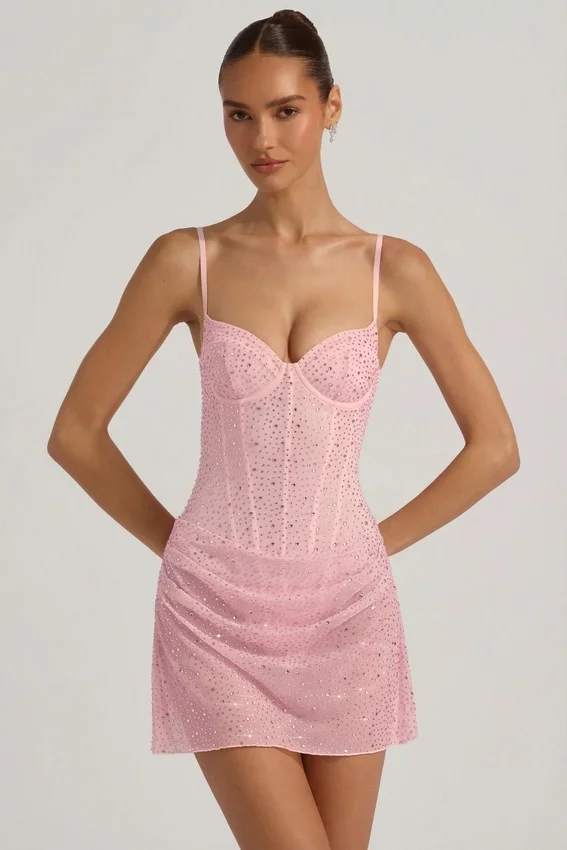Connie halvgenomskinlig, dekorerad, draperad korsettklänning i rosa Connie halvgenomskinlig, dekorerad, draperad korsettklänning i rosa