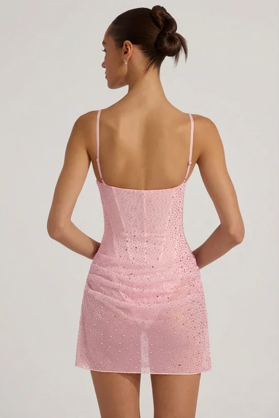 Connie halvgenomskinlig, dekorerad, draperad korsettklänning i rosa Connie halvgenomskinlig, dekorerad, draperad korsettklänning i rosa