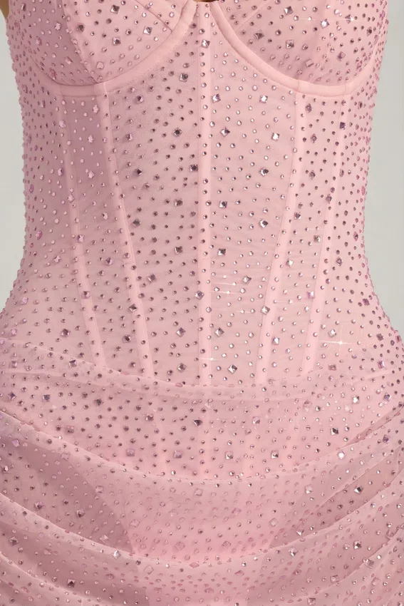 Connie halvgenomskinlig, dekorerad, draperad korsettklänning i rosa Connie halvgenomskinlig, dekorerad, draperad korsettklänning i rosa