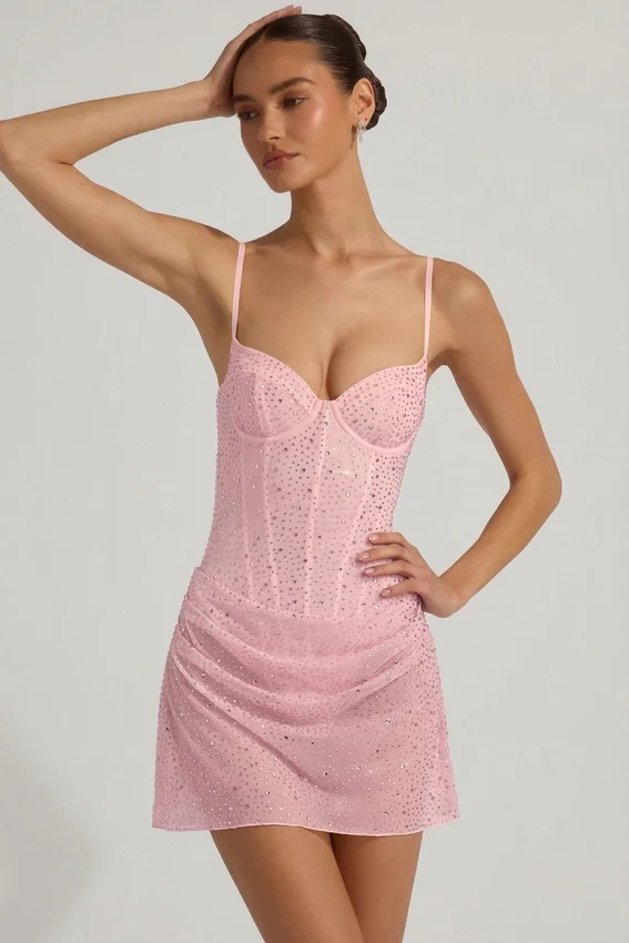 Connie halvgenomskinlig, dekorerad, draperad korsettklänning i rosa Connie halvgenomskinlig, dekorerad, draperad korsettklänning i rosa