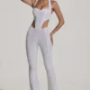 Coralena Embellished Cut-Out Jumpsuit i vitt Coralena Embellished Cut-Out Jumpsuit i vitt