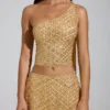 Cosette-top med asymmetrisk scarf-detalj i guld Cosette-top med asymmetrisk scarf-detalj i guld