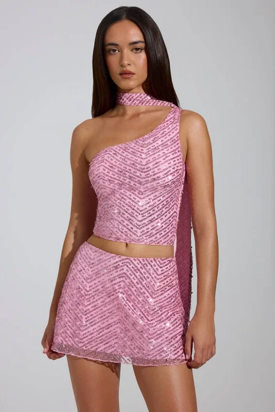 Cosette-top med asymmetrisk scarf-detalj i rosa Cosette-top med asymmetrisk scarf-detalj i rosa