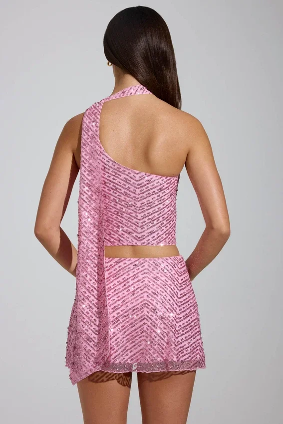 Cosette-top med asymmetrisk scarf-detalj i rosa Cosette-top med asymmetrisk scarf-detalj i rosa