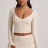 Dagny Ruffle långärmad spets-top i ivory Dagny Ruffle långärmad spets-top i ivory
