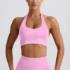 Define Luxe sport-BH med halterneck i bubblegumrosa Define Luxe sport-BH med halterneck i bubblegumrosa