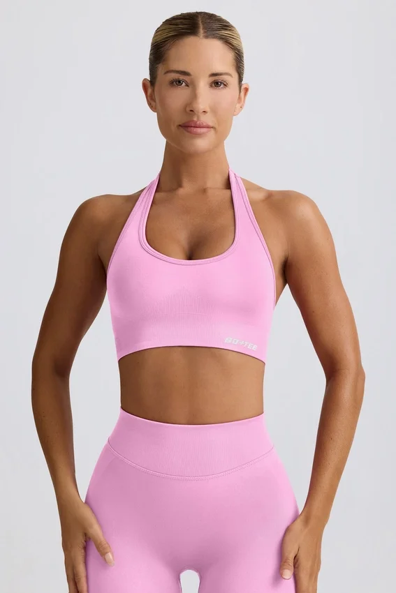 Define Luxe sport-BH med halterneck i bubblegumrosa Define Luxe sport-BH med halterneck i bubblegumrosa
