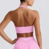 Define Luxe sport-BH med halterneck i bubblegumrosa Define Luxe sport-BH med halterneck i bubblegumrosa