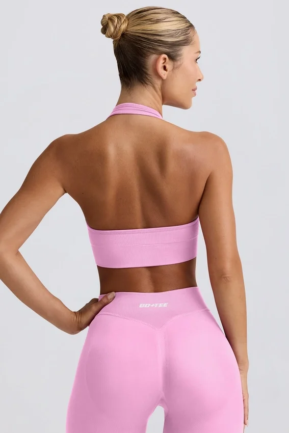 Define Luxe sport-BH med halterneck i bubblegumrosa Define Luxe sport-BH med halterneck i bubblegumrosa