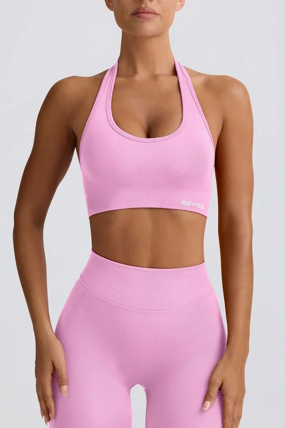 Define Luxe sport-BH med halterneck i bubblegumrosa Define Luxe sport-BH med halterneck i bubblegumrosa