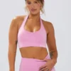Define Luxe sport-BH med halterneck i bubblegumrosa Define Luxe sport-BH med halterneck i bubblegumrosa