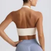 Define Luxe sport-BH med halterneck i vitt Define Luxe sport-BH med halterneck i vitt