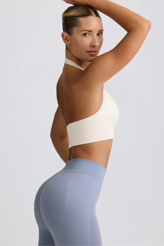 Define Luxe sport-BH med halterneck i vitt Define Luxe sport-BH med halterneck i vitt