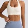 Define Luxe sport-BH med halterneck i vitt Define Luxe sport-BH med halterneck i vitt