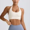 Define Luxe sport-BH med halterneck i vitt Define Luxe sport-BH med halterneck i vitt