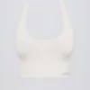Define Luxe sport-BH med halterneck i vitt Define Luxe sport-BH med halterneck i vitt