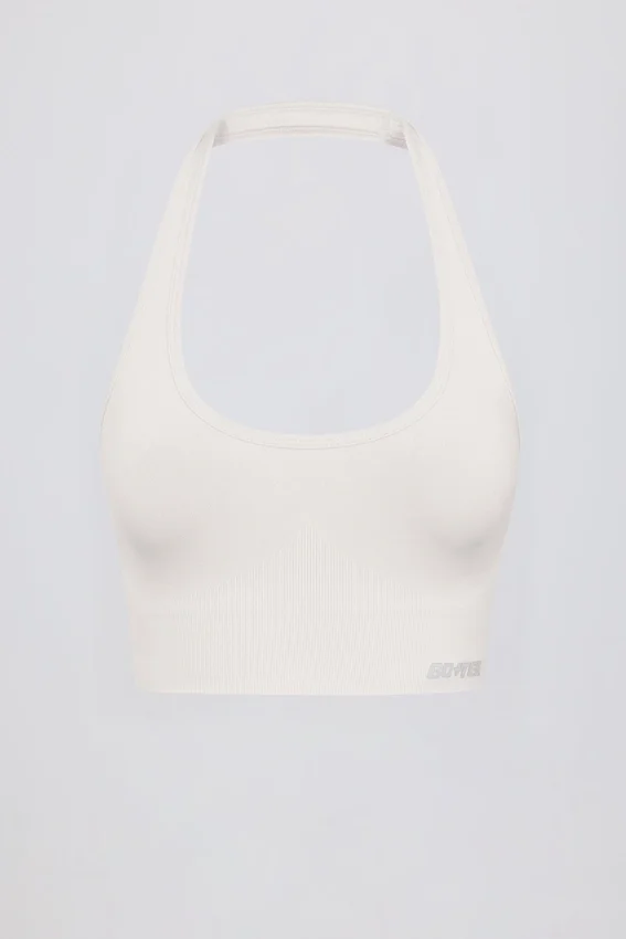 Define Luxe sport-BH med halterneck i vitt Define Luxe sport-BH med halterneck i vitt