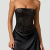 Eden Embellished Draped Strapless A-Line Miniklänning i svart Eden Embellished Draped Strapless A-Line Miniklänning i svart